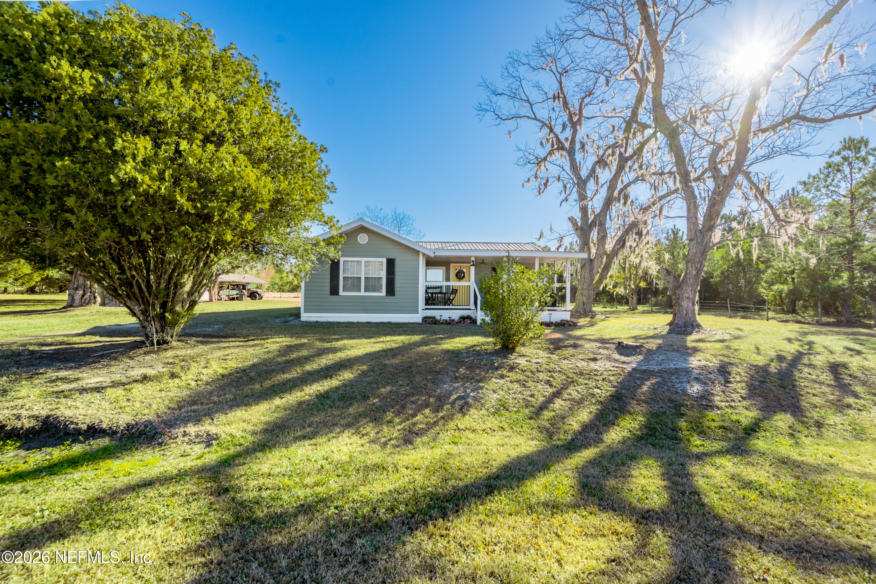 23779 Northwest 225a Road, Unit COUNTY Starke, FL 32091 - Photo 5 of 73 a view of house with outdoor space
