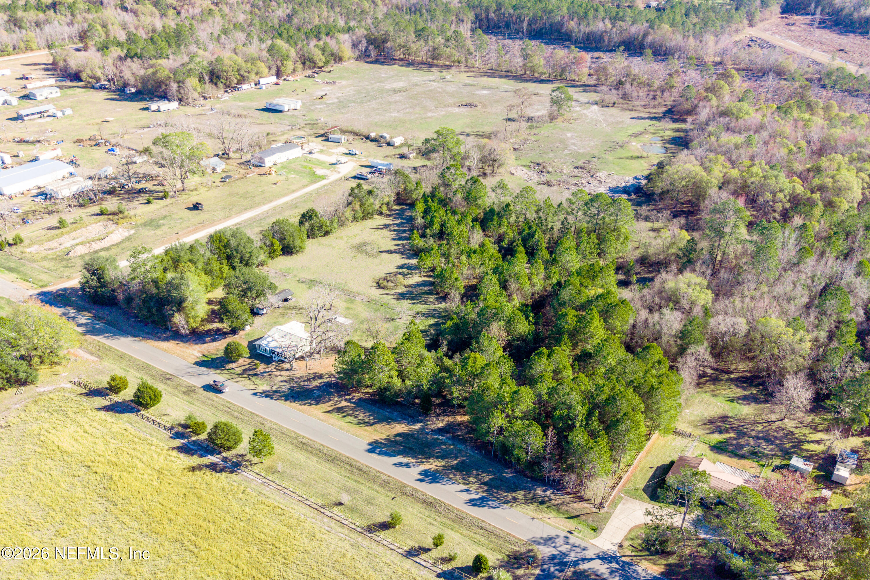 23779 Northwest 225a Road, Unit COUNTY Starke, FL 32091 - Photo 63 of 73 a view of a pathway with a yard