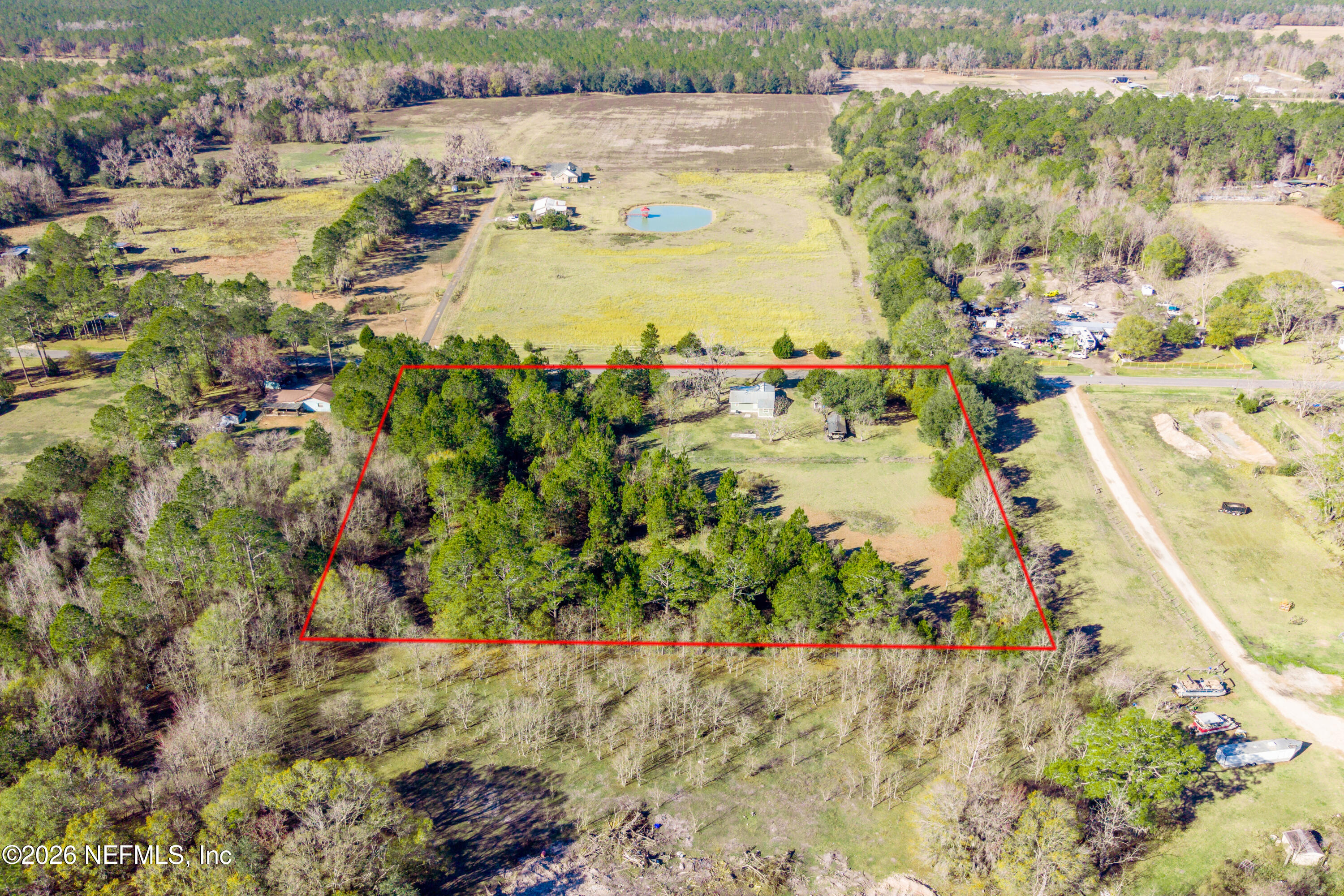 23779 Northwest 225a Road, Unit COUNTY Starke, FL 32091 - Photo 72 of 73 a view of a lake with a mountain view