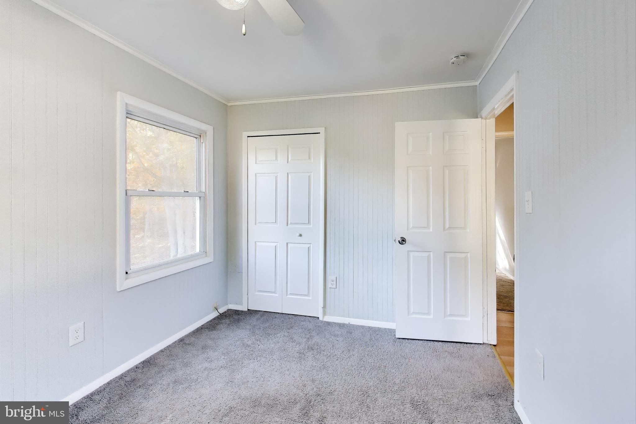 119 Jefferson Road Waldorf, MD 20602 - Photo 17 of 44 a view of an empty room with window and closet area