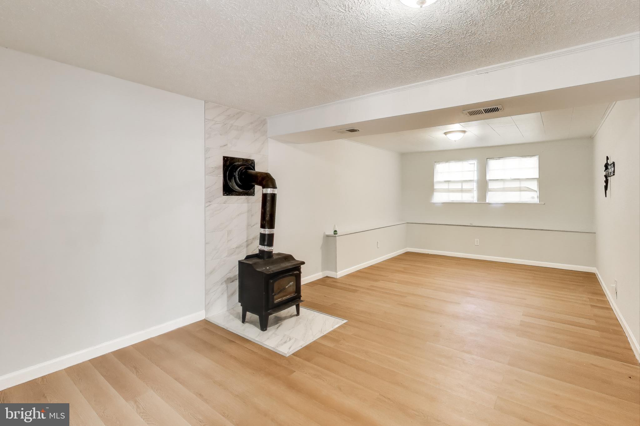 119 Jefferson Road Waldorf, MD 20602 - Photo 23 of 44 wooden floor in an empty room with a window