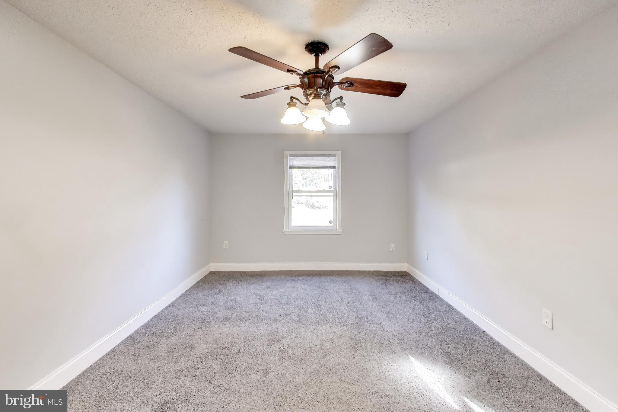 119 Jefferson Road Waldorf, MD 20602 - Photo 24 of 44 an empty room with window and ceiling fan