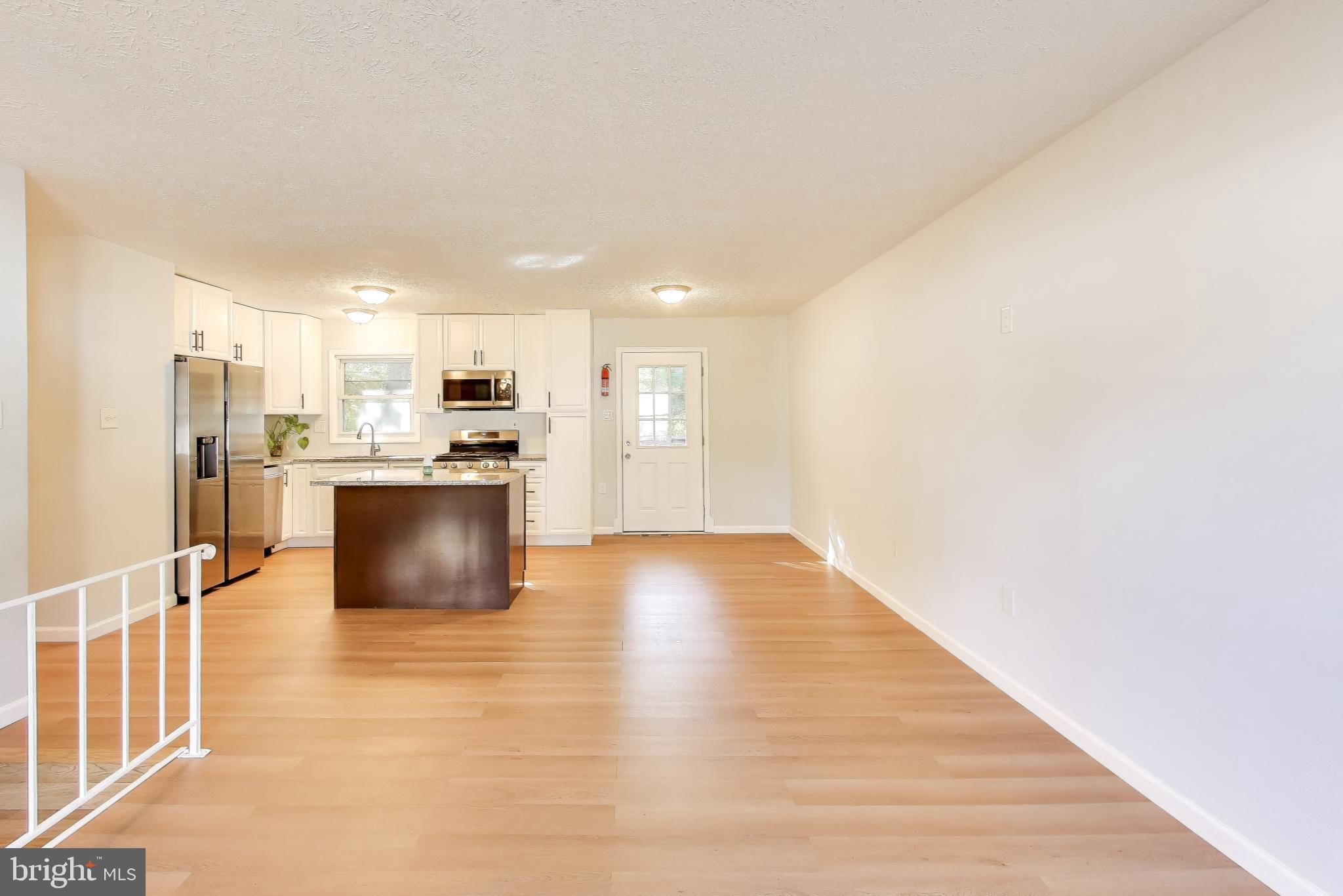 119 Jefferson Road Waldorf, MD 20602 - Photo 10 of 44 a view of kitchen with wooden floor