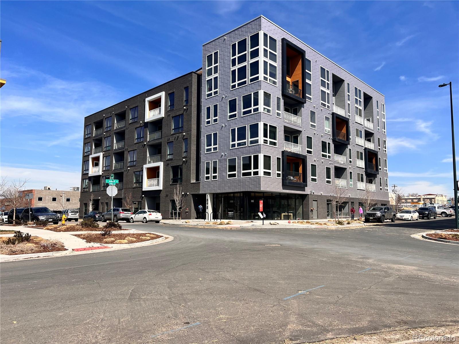 1899 South Acoma Street Denver, CO 80223 - Photo 2 of 3 a front view of a building with street view