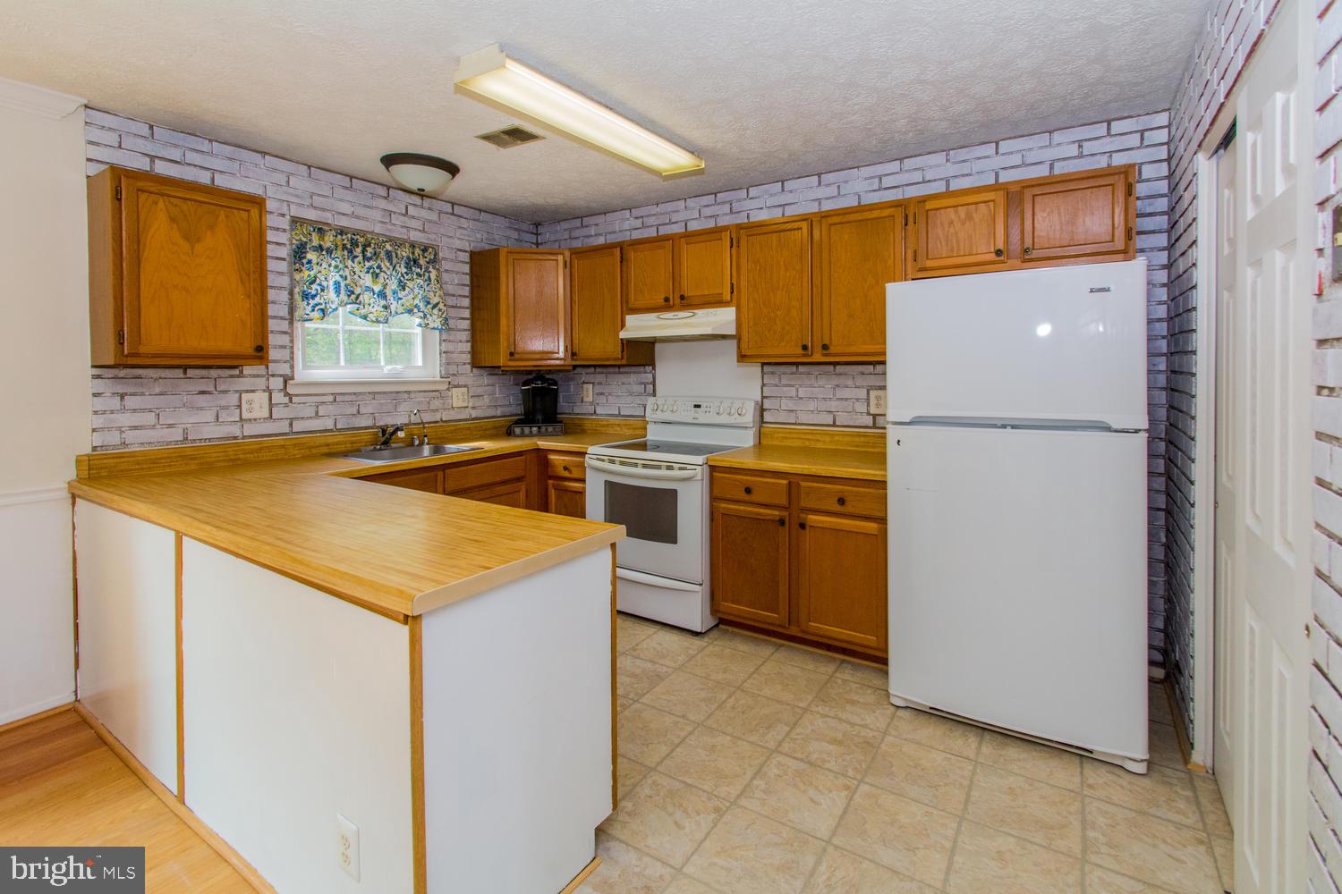 343 Rambling Ridge Court Pasadena, MD 21122 - Photo 14 of 40 LARGE PANTRY IN KITCHEN