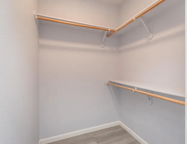 a view of an empty walk in closet