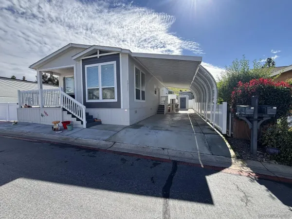a front view of a house with garage