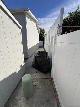 a living room with furniture and a gate