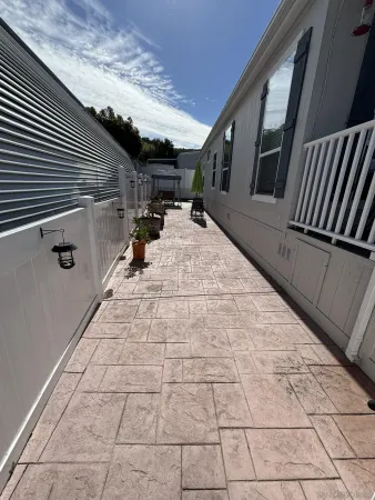 a view of a porch with wooden floor