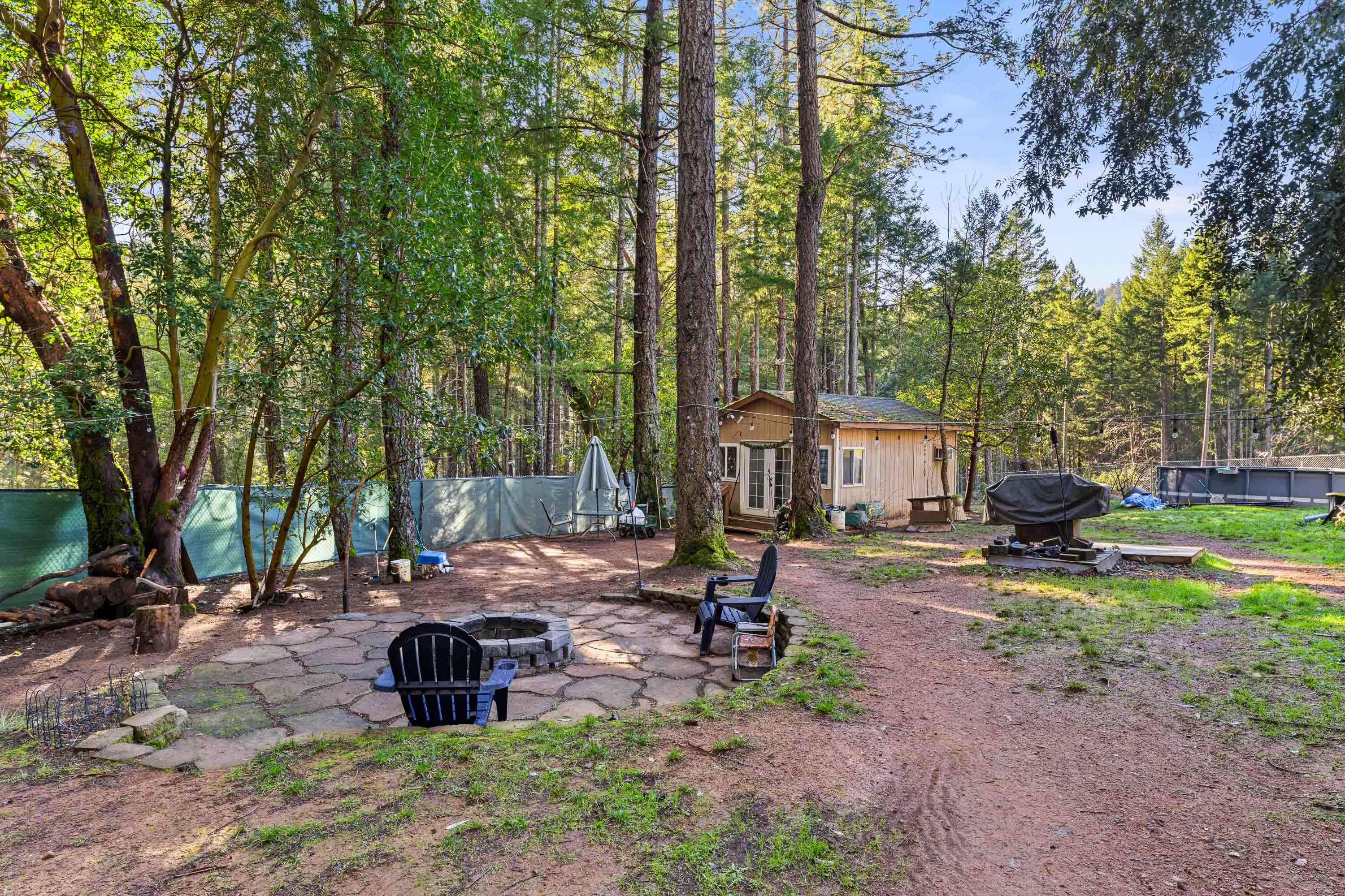 1492 Crooks Creek Road Selma, OR 97538 - Photo 20 of 38 Fire Pit
