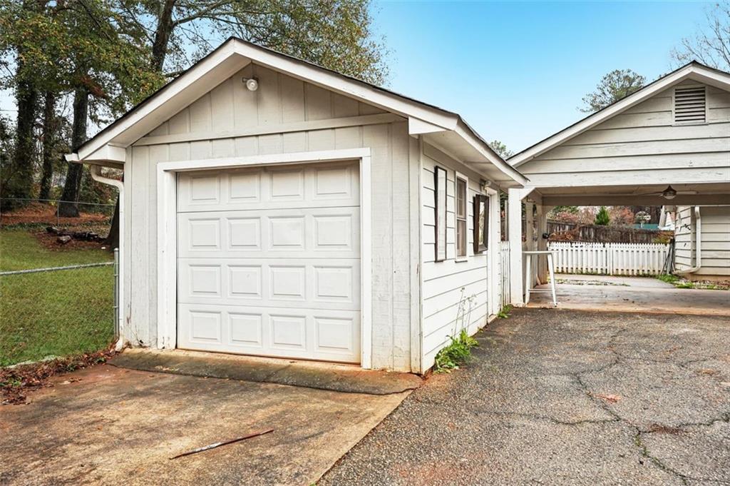 5151 Lilburn Stone Mountain Road Lilburn, GA 30047 - Photo 49 of 58 a view of a house with a outdoor space