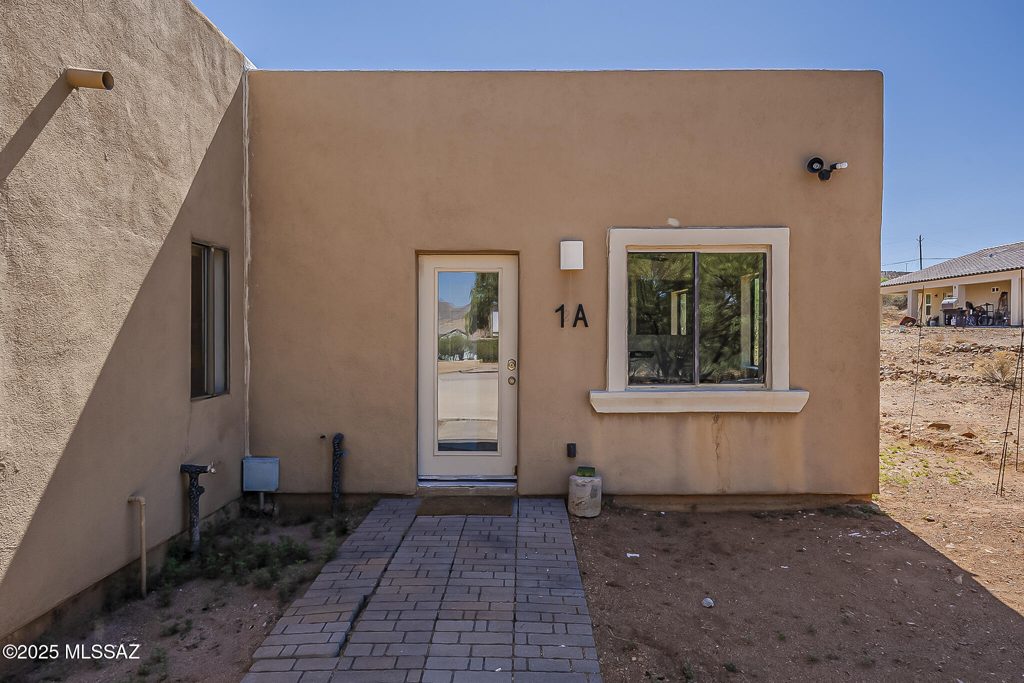 1503 Camino Bacalao Rio Rico, AZ 85648 - Photo 34 of 43 a view of a house with windows