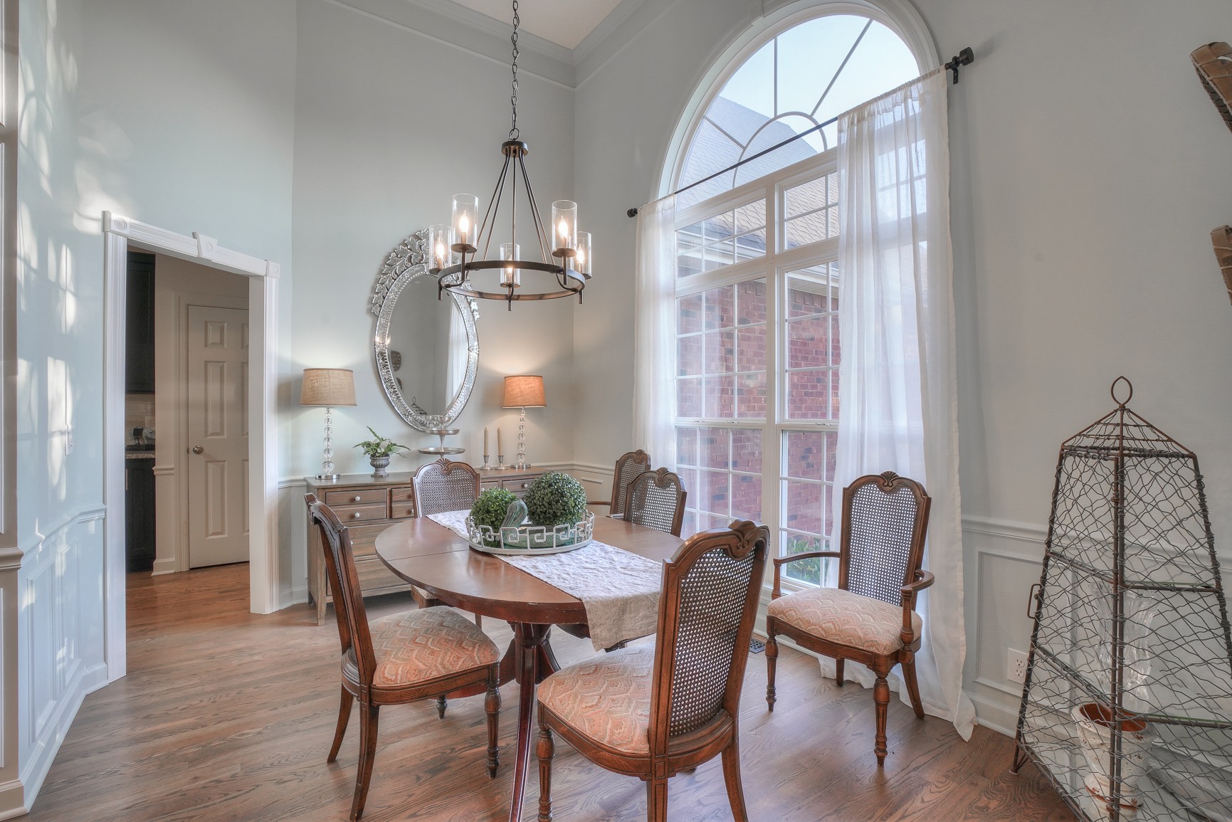 1211 Marathon Drive Murfreesboro, TN 37129 - Photo 14 of 37 a view of a dining room with furniture a chandelier and wooden floor
