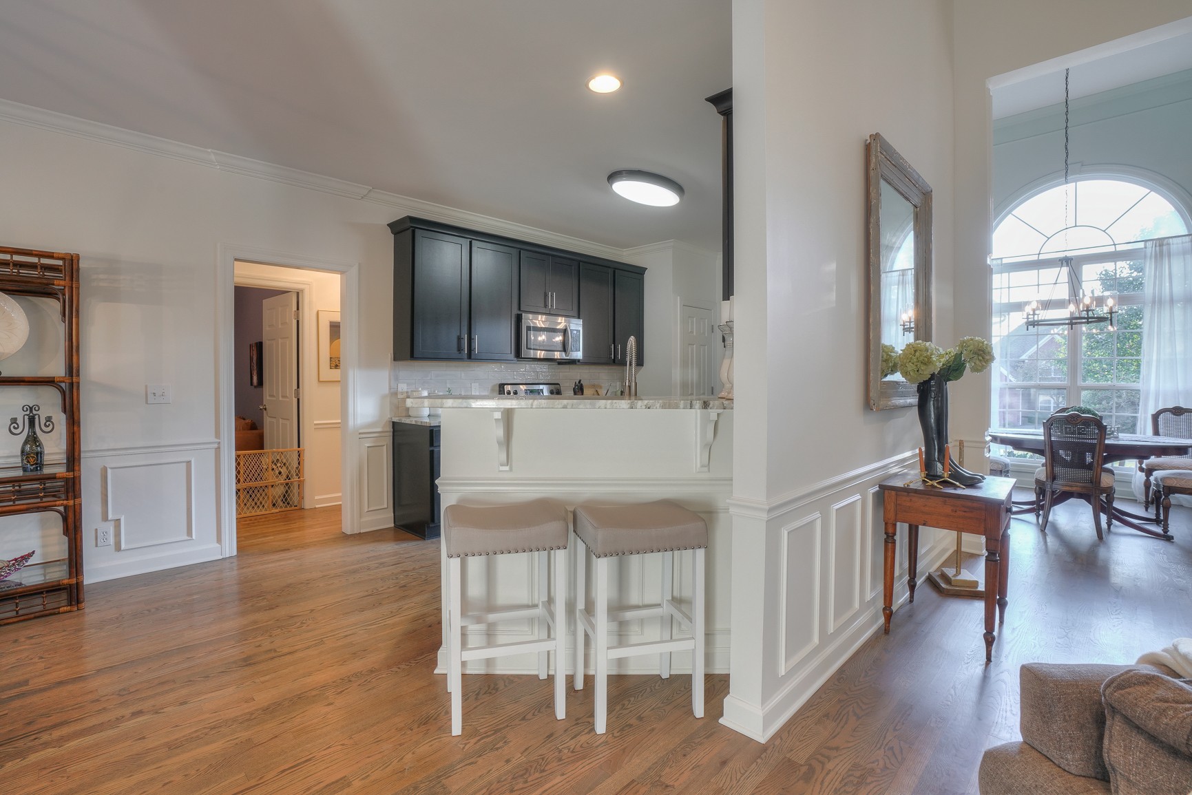 1211 Marathon Drive Murfreesboro, TN 37129 - Photo 17 of 37 a living room with furniture a flat screen tv and kitchen view