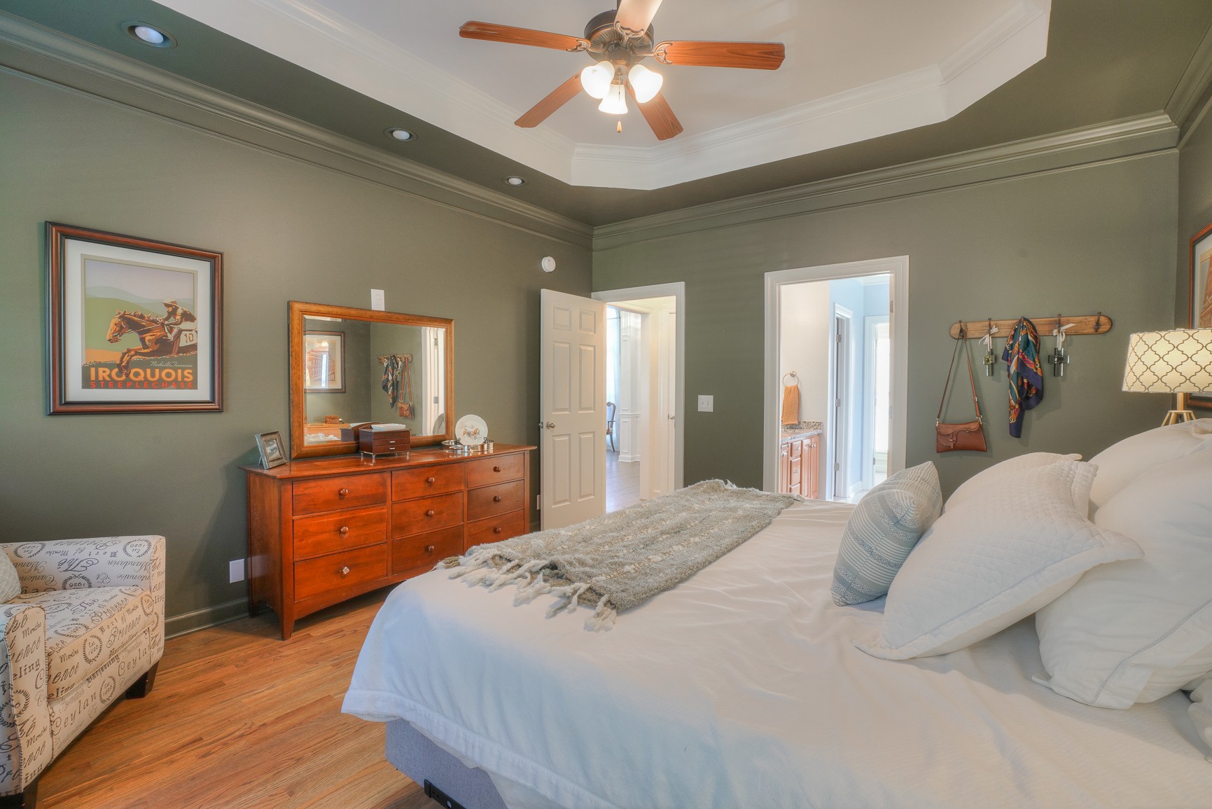 1211 Marathon Drive Murfreesboro, TN 37129 - Photo 24 of 37 a bedroom with a large bed and a chandelier