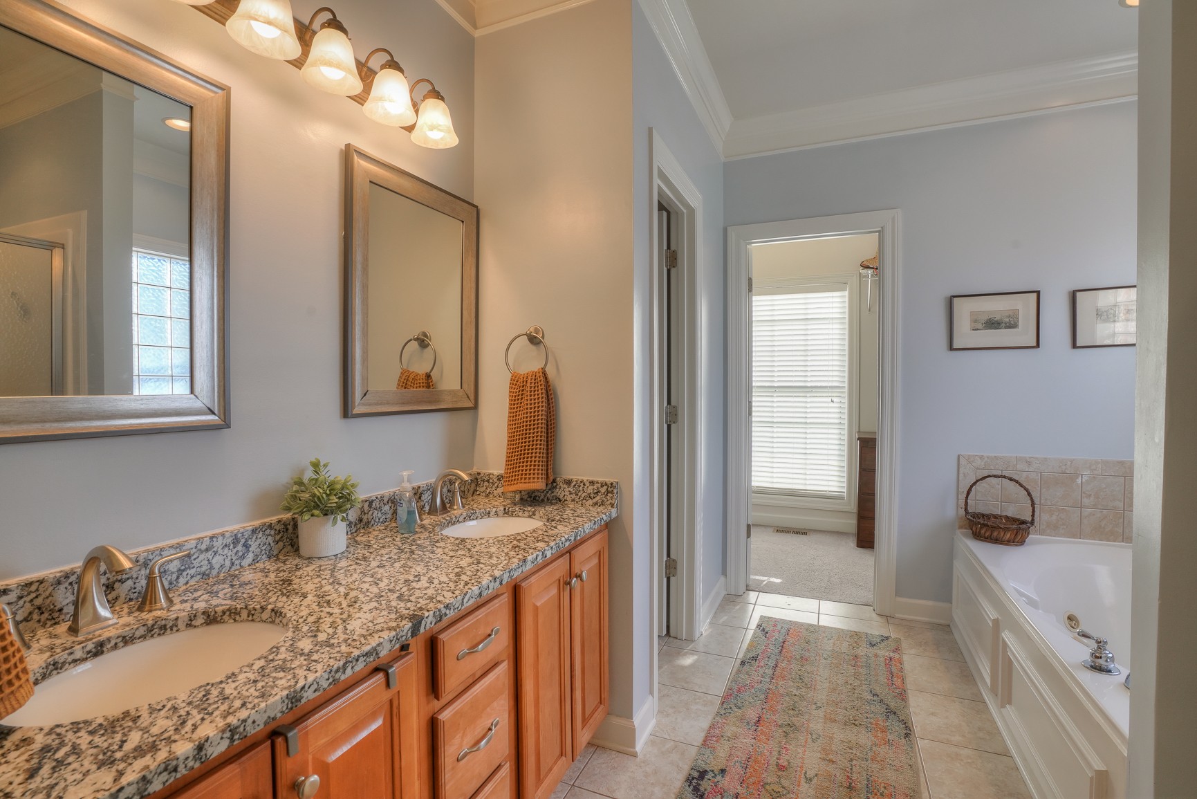 1211 Marathon Drive Murfreesboro, TN 37129 - Photo 26 of 37 a bathroom with a granite countertop sink and a mirror