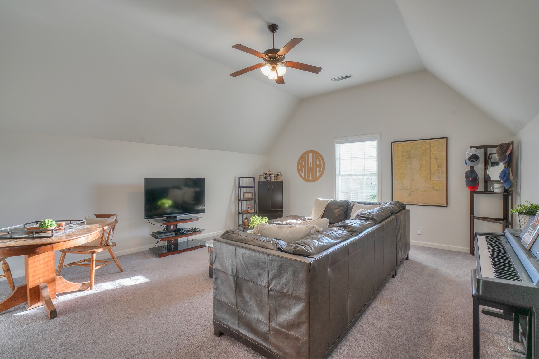 1211 Marathon Drive Murfreesboro, TN 37129 - Photo 33 of 37 a living room with furniture and a flat screen tv