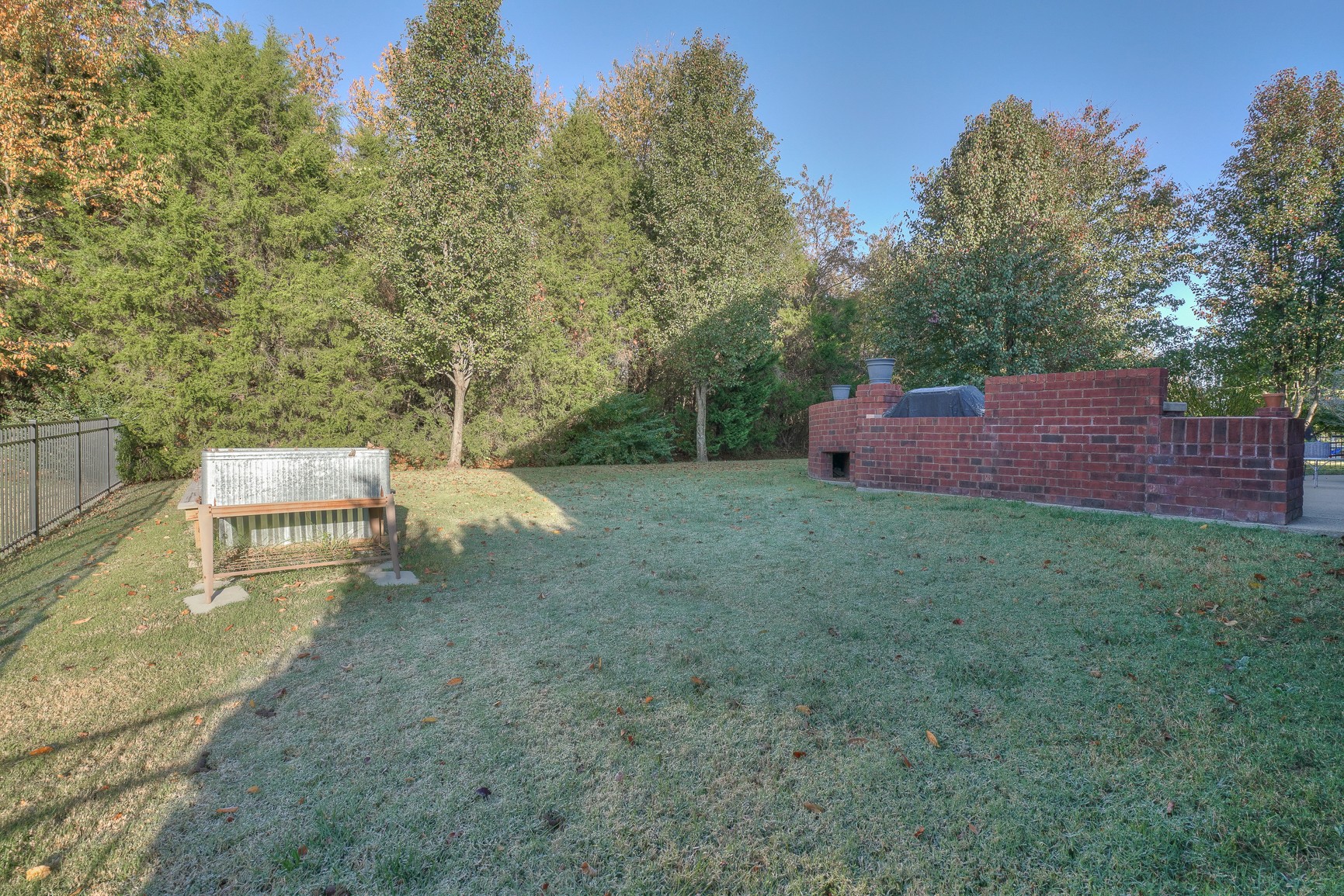 1211 Marathon Drive Murfreesboro, TN 37129 - Photo 6 of 37 a backyard of a house with table and chairs