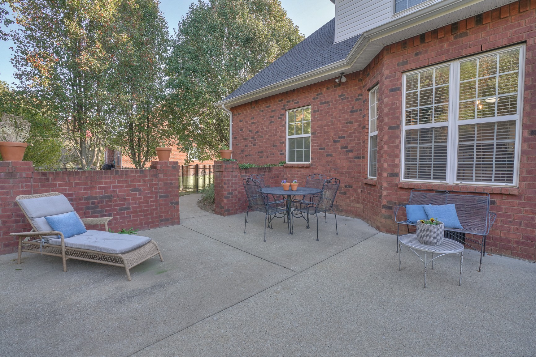1211 Marathon Drive Murfreesboro, TN 37129 - Photo 10 of 37 a view of a patio with table and chairs and wooden fence