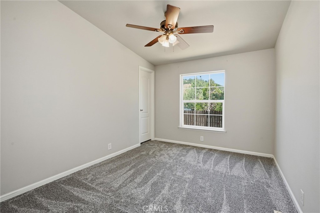 2860 Spring Valley Road Clearlake Oaks, CA 95423 - Photo 29 of 38 a view of an empty room with a window