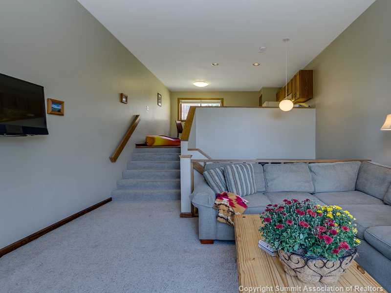 10000 Ryan Gulch Road, Unit 103G Silverthorne, CO 80498 - Photo 3 of 16 Living Room.
