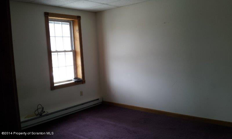 4170 Madisonville Road Moscow, PA 18444 - Photo 9 of 19 an empty room with a window