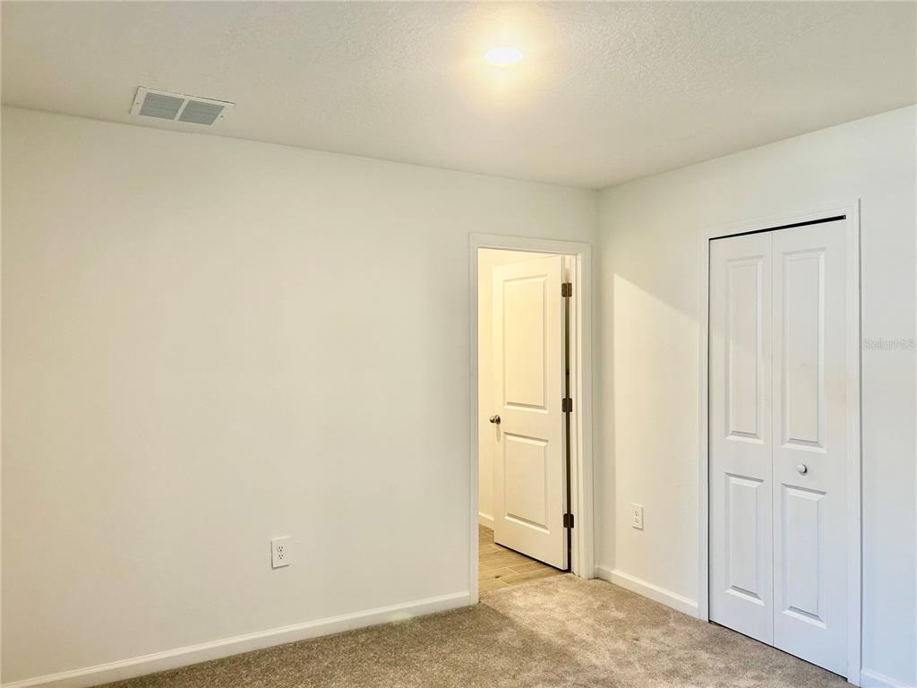 3514 Southeast 37th Ave Road Ocala, FL 34480 - Photo 28 of 42 an empty room with closet area