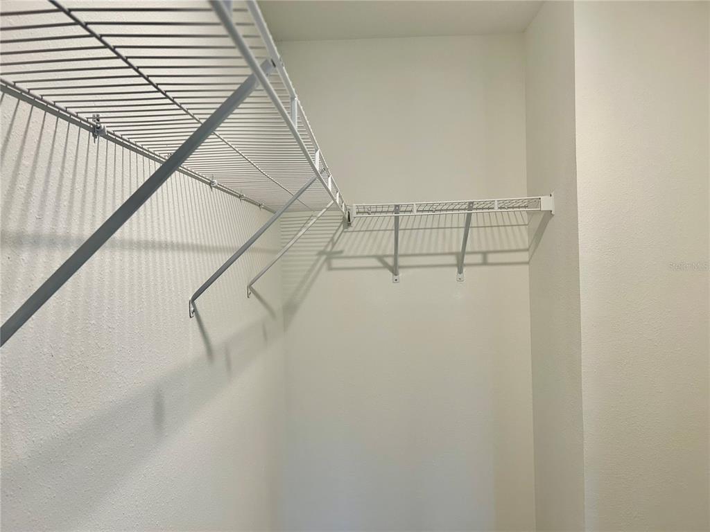 3514 Southeast 37th Ave Road Ocala, FL 34480 - Photo 38 of 42 a view of small space with racks on the wall
