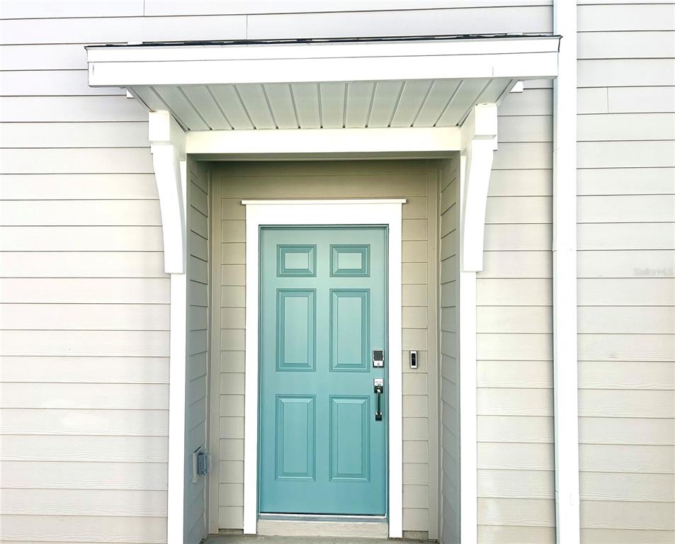 3514 Southeast 37th Ave Road Ocala, FL 34480 - Photo 5 of 42 a close view of a wooden door
