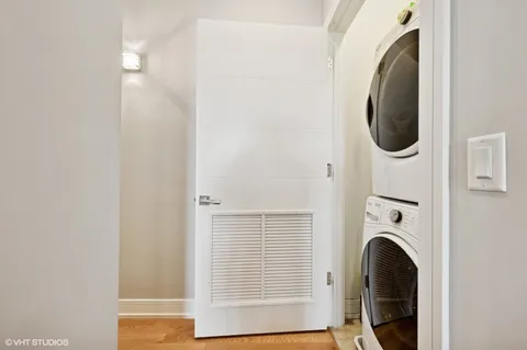 a close view of a utility room with dryer and washer