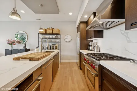 a kitchen that has a lot of cabinets