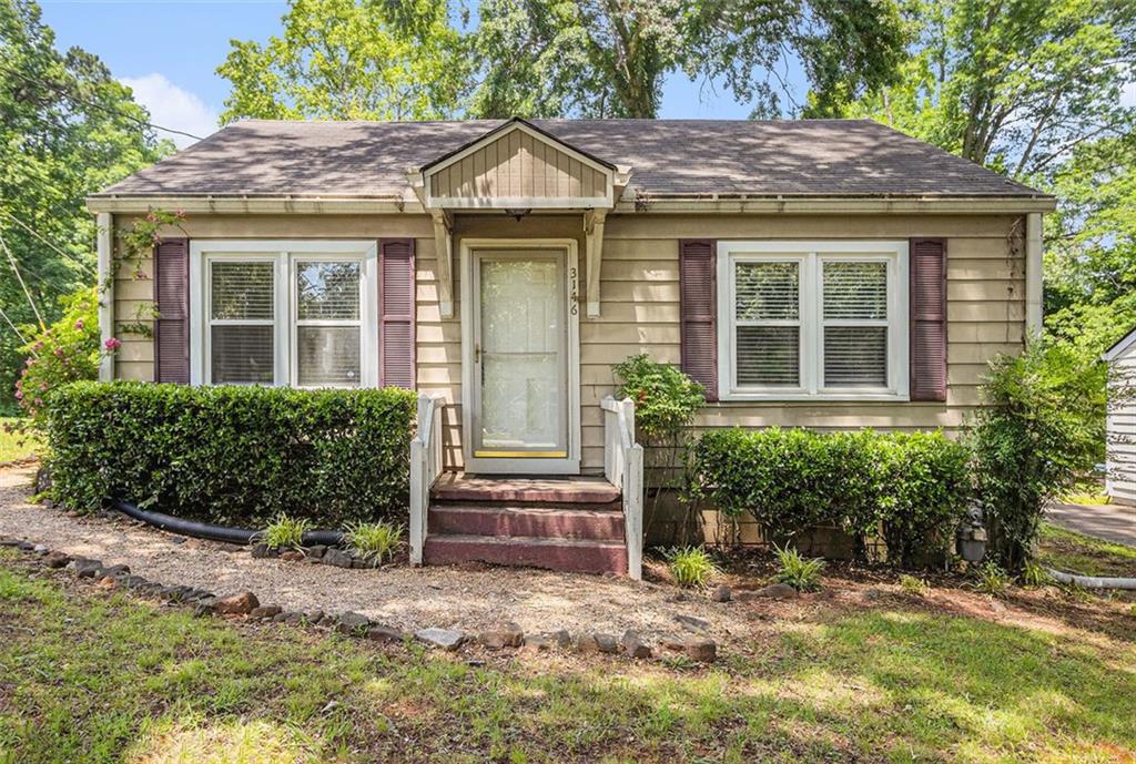 3146 Alston Drive Decatur, GA 30032 - Photo 1 of 1 a front view of a house with a yard