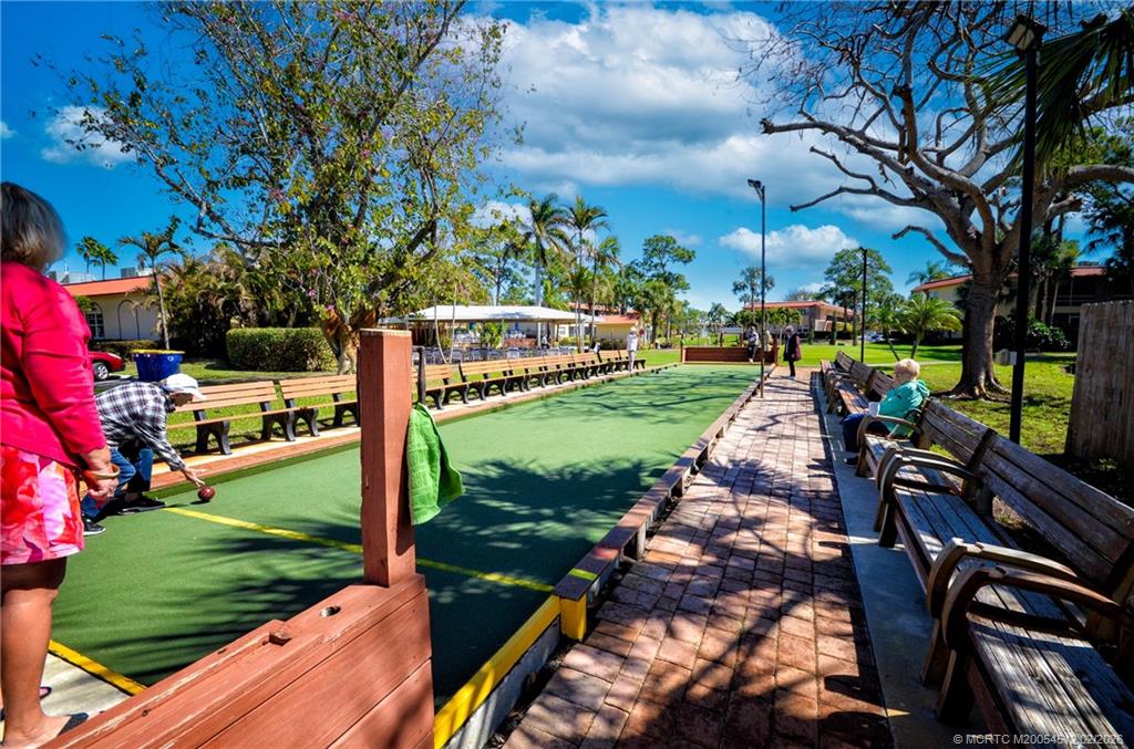 1963 Southwest Palm City Road, Unit F Stuart, FL 34994 - Photo 14 of 19 a view of a park with large trees