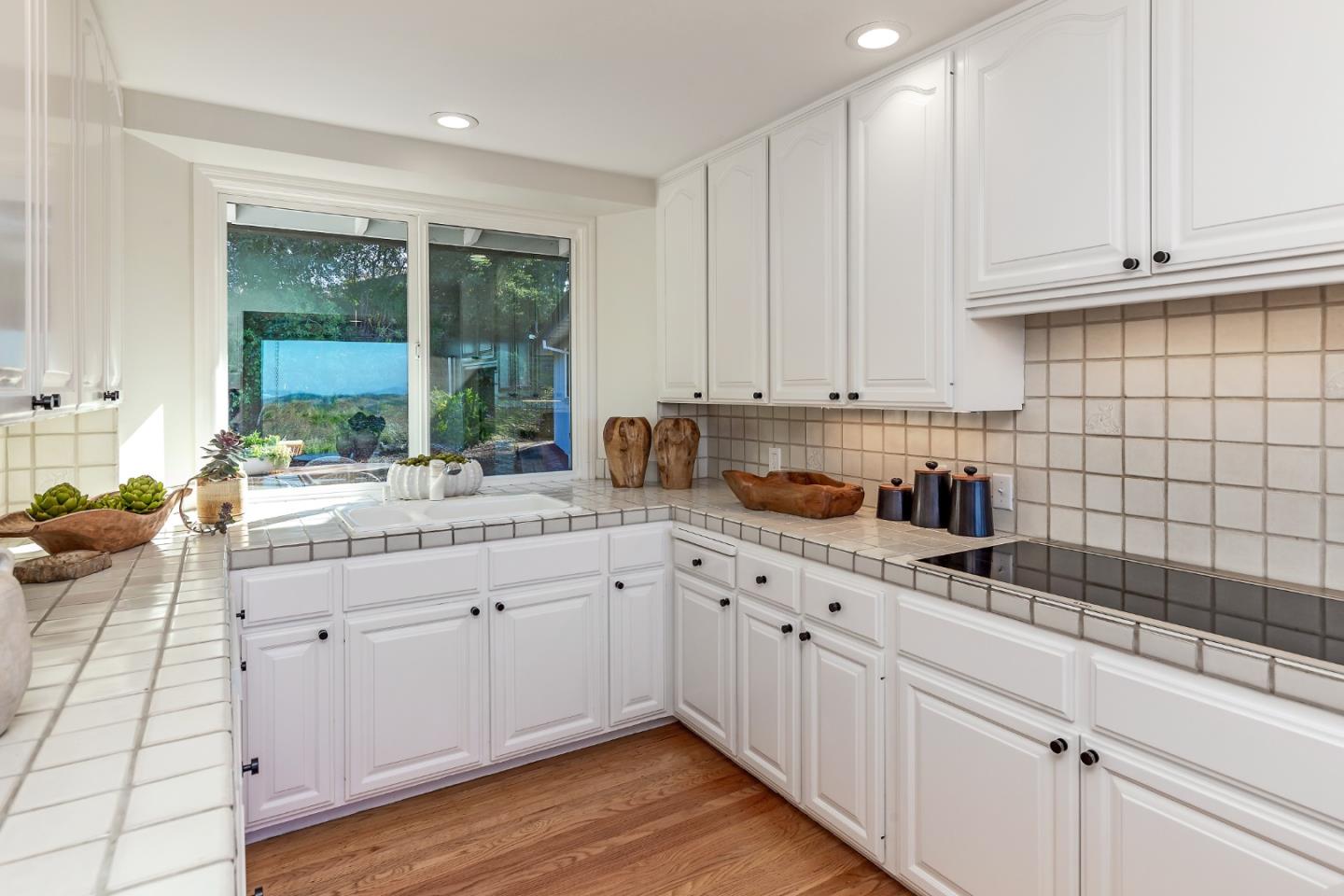 600 Westridge Drive Portola Valley, CA 94028 - Photo 11 of 22 a kitchen with a sink and cabinets