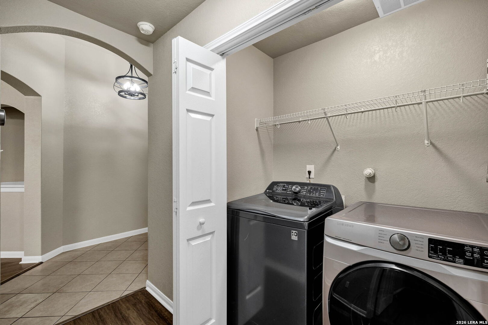 4015 Shervin Way Converse, TX 78109 - Photo 19 of 43 a utility room with dryer and washer