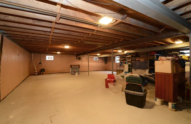 a view of a storage room with furniture