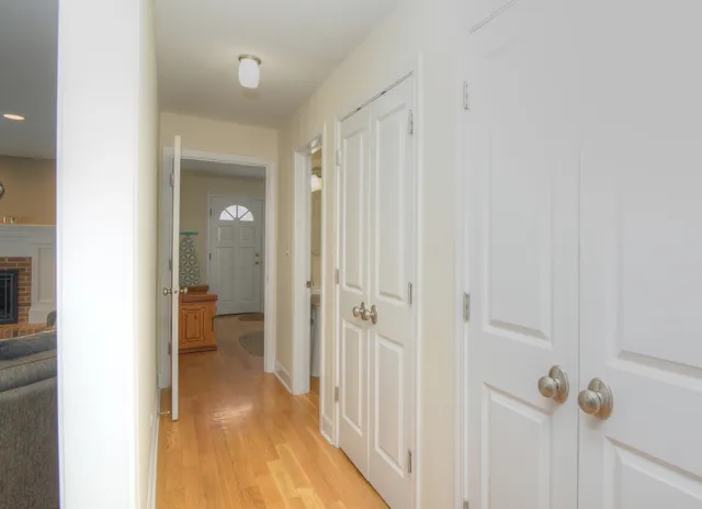 a view of a bathroom from a hallway