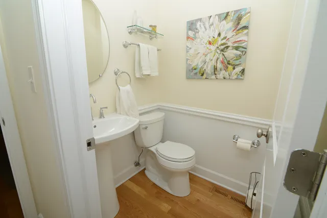 a bathroom with a toilet and a sink