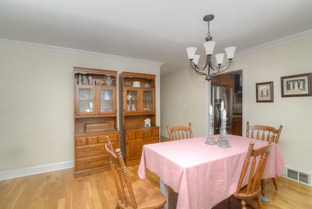 a view of a dining room with furniture