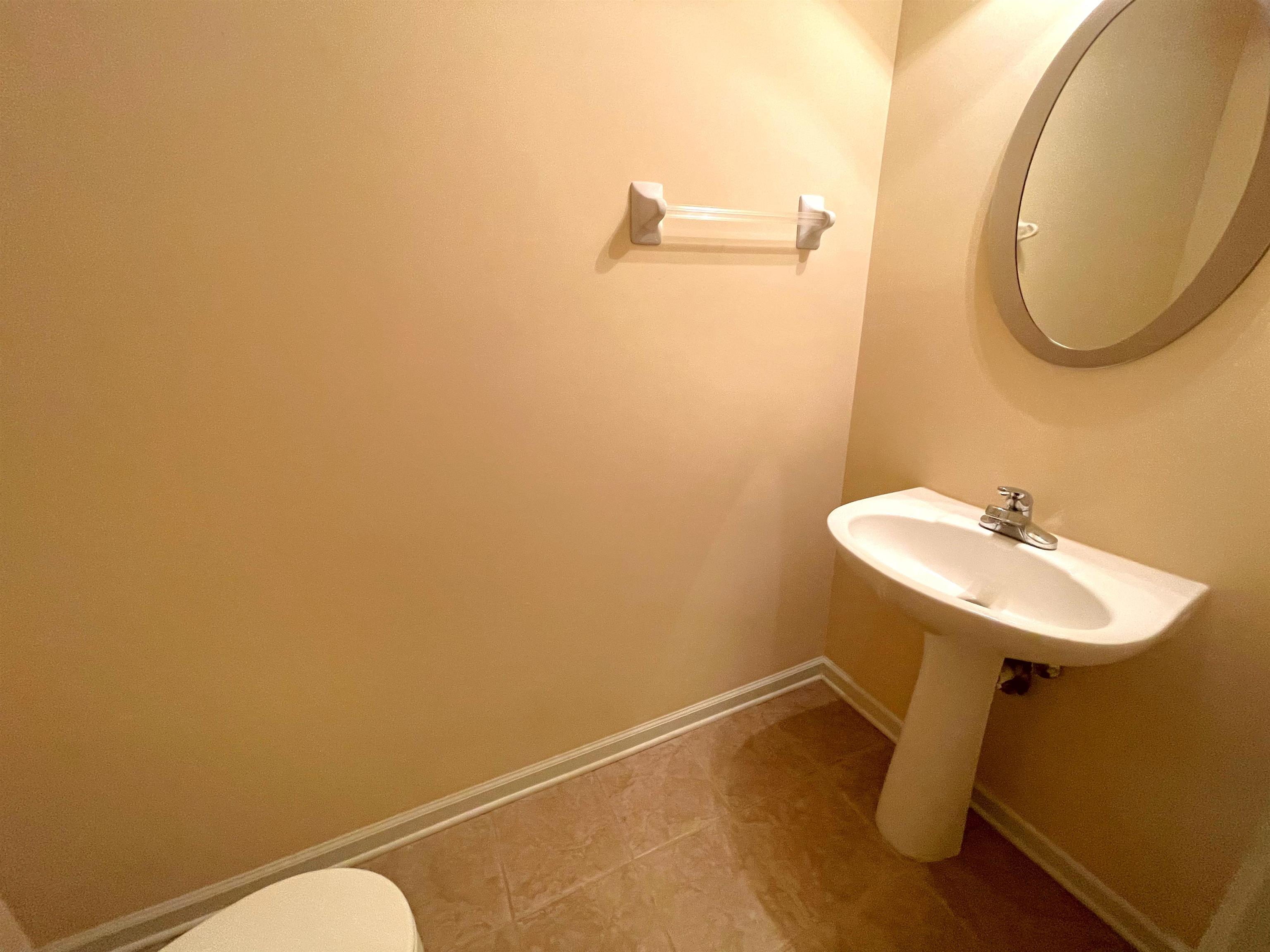 4965 Shaws Ridge Trail Arlington, TN 38002 - Photo 11 of 19 a bathroom with a sink and a mirror