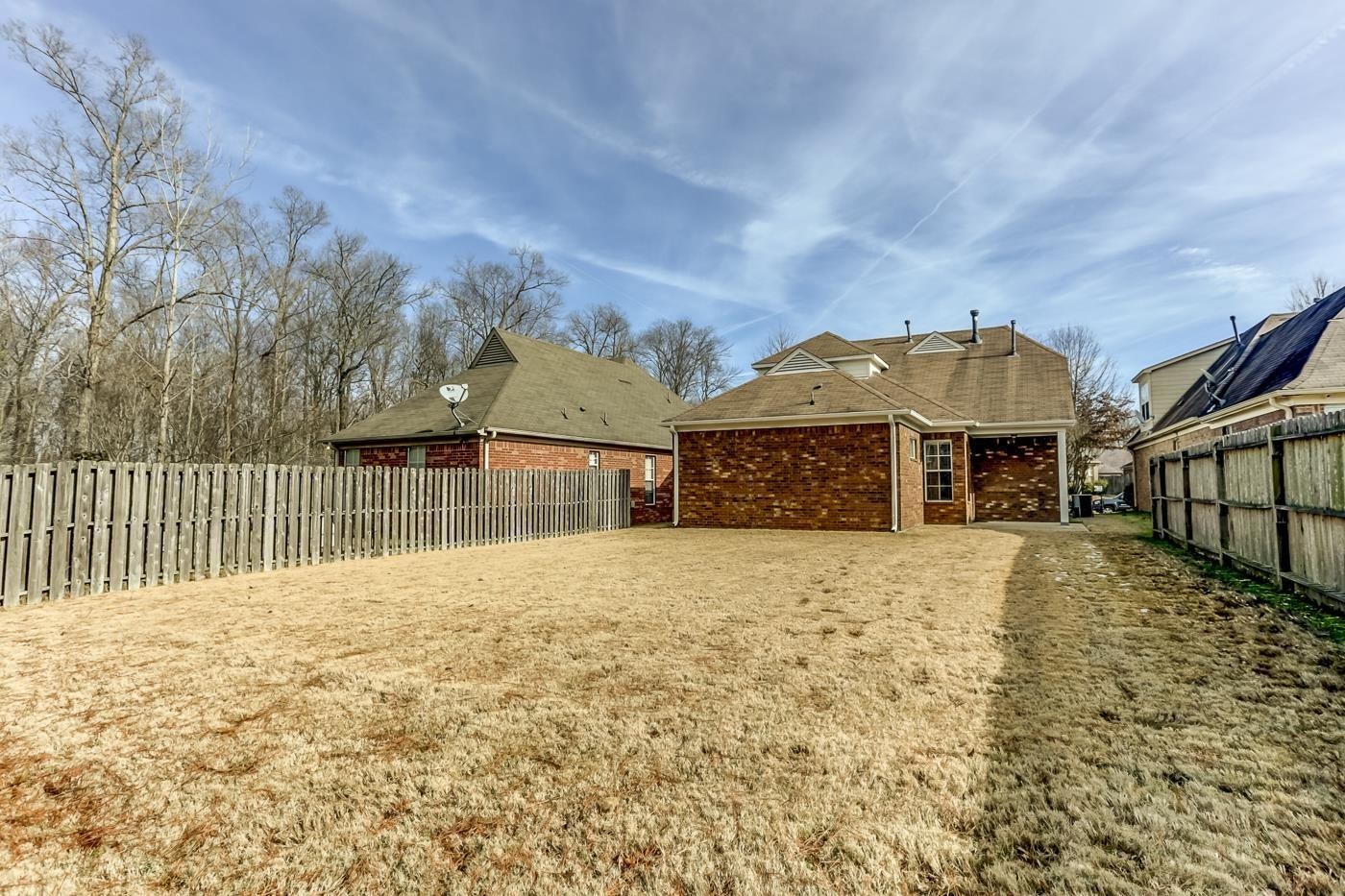 4965 Shaws Ridge Trail Arlington, TN 38002 - Photo 18 of 19 a front view of a house with a yard covered with snow in front of house