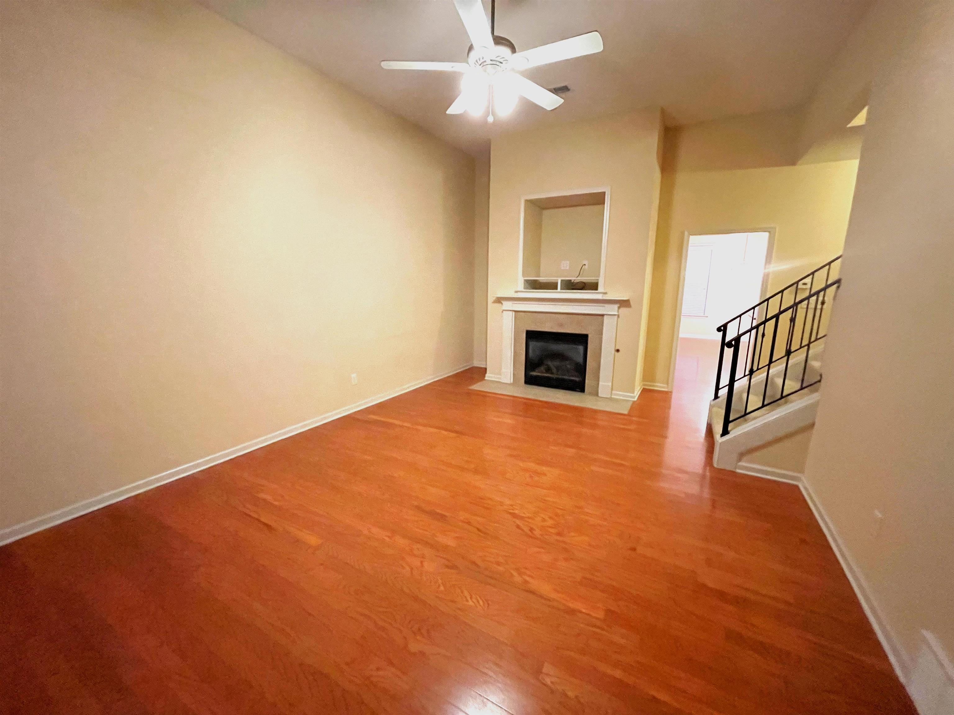 4965 Shaws Ridge Trail Arlington, TN 38002 - Photo 2 of 19 a view of empty room with fireplace and fan