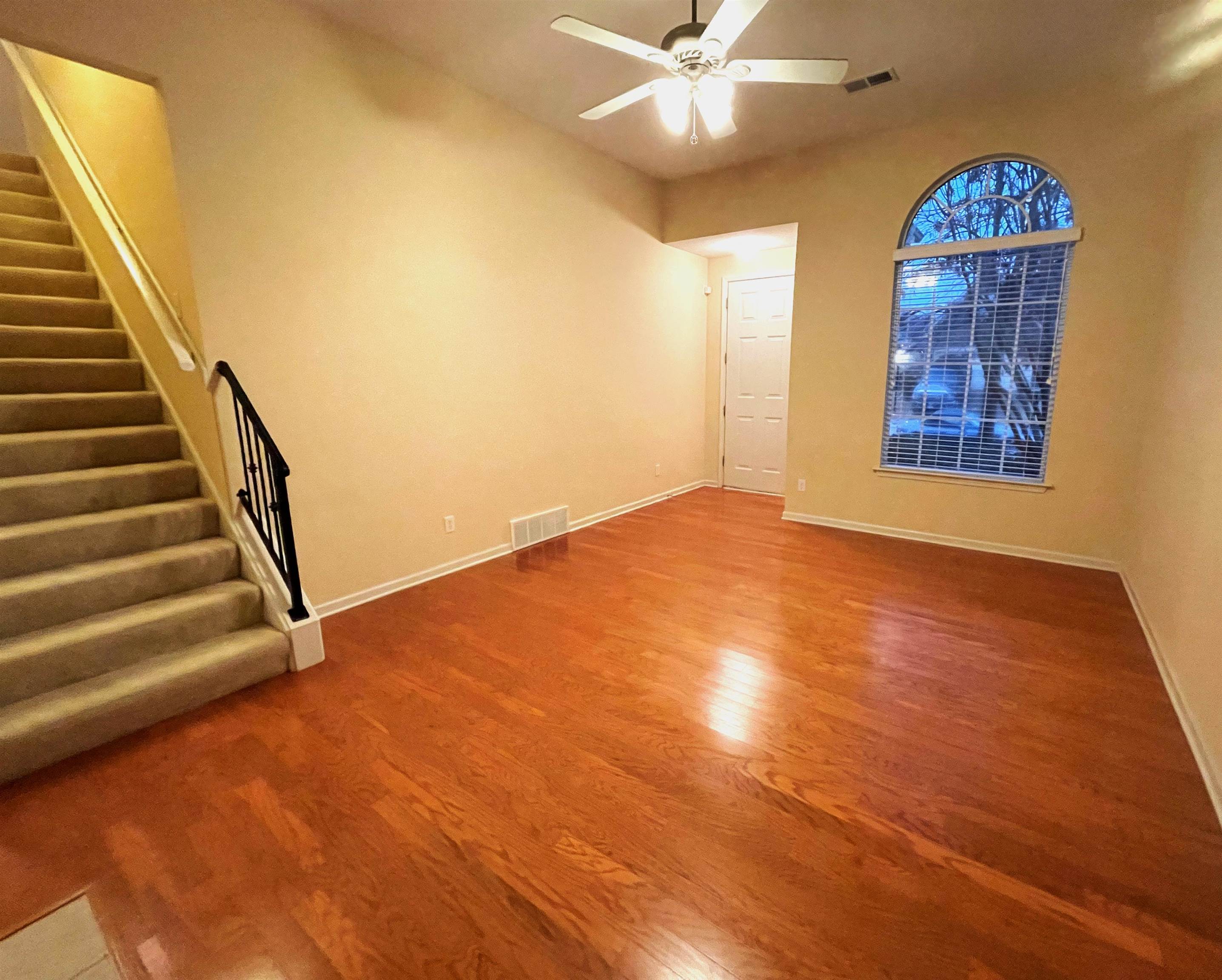 4965 Shaws Ridge Trail Arlington, TN 38002 - Photo 3 of 19 wooden floor in an empty room with a window