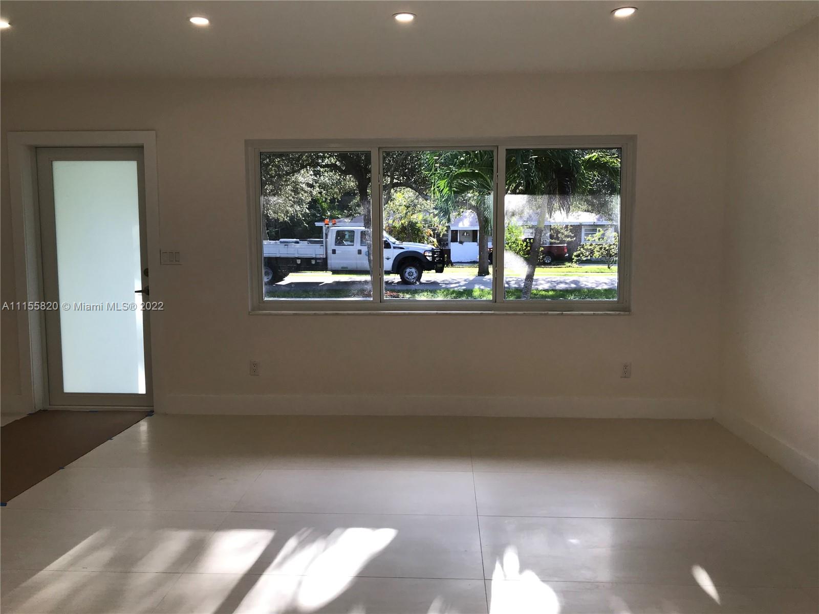 11720 Southwest 81st Road, Unit 11720 Pinecrest, FL 33156 - Photo 19 of 33 a view of a room that has a window