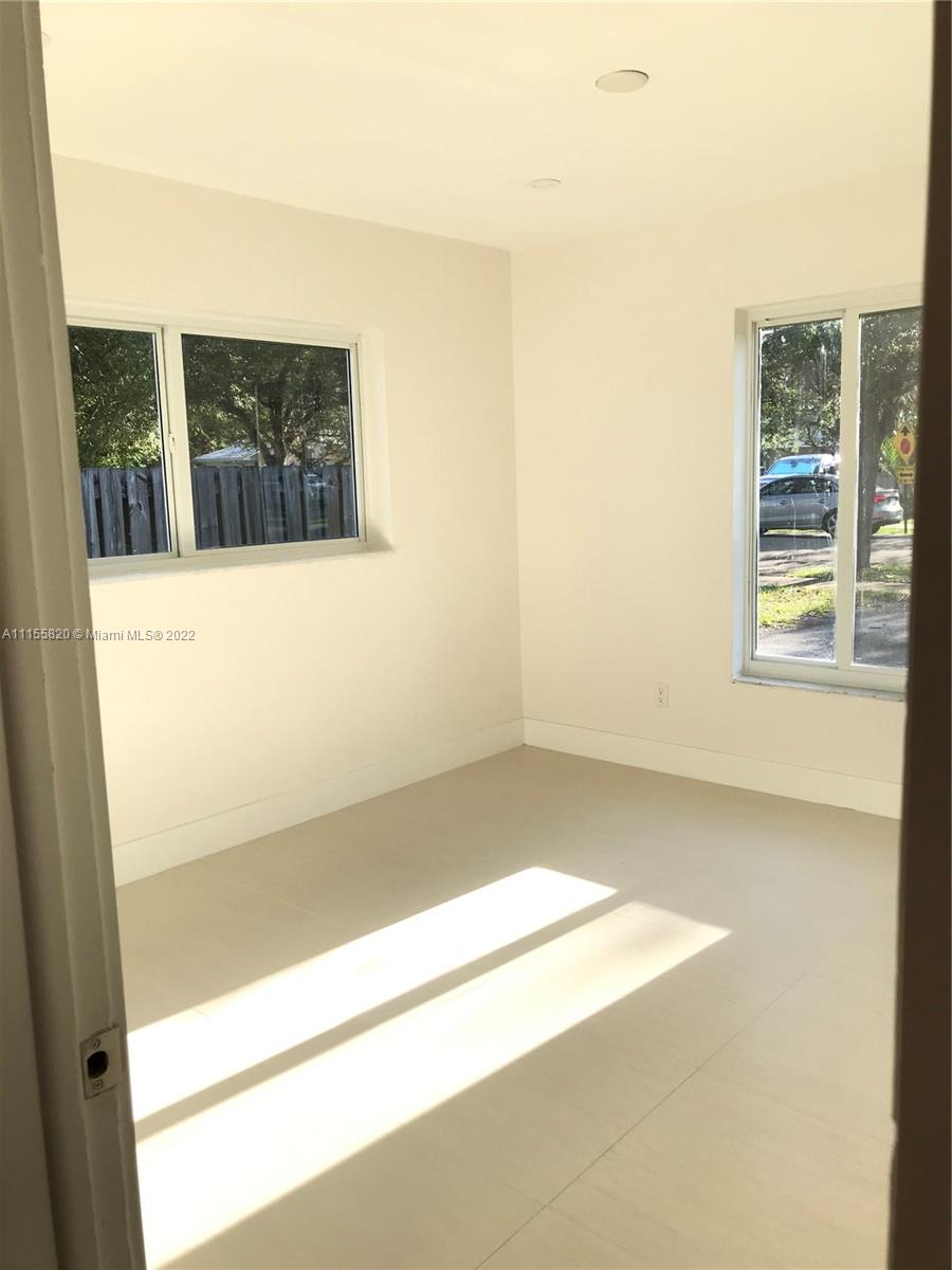 11720 Southwest 81st Road, Unit 11720 Pinecrest, FL 33156 - Photo 25 of 33 a view of a room with a window