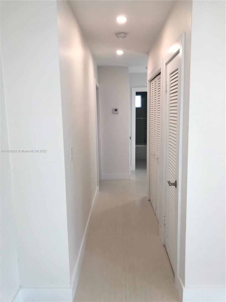 11720 Southwest 81st Road, Unit 11720 Pinecrest, FL 33156 - Photo 27 of 33 a view of an empty room