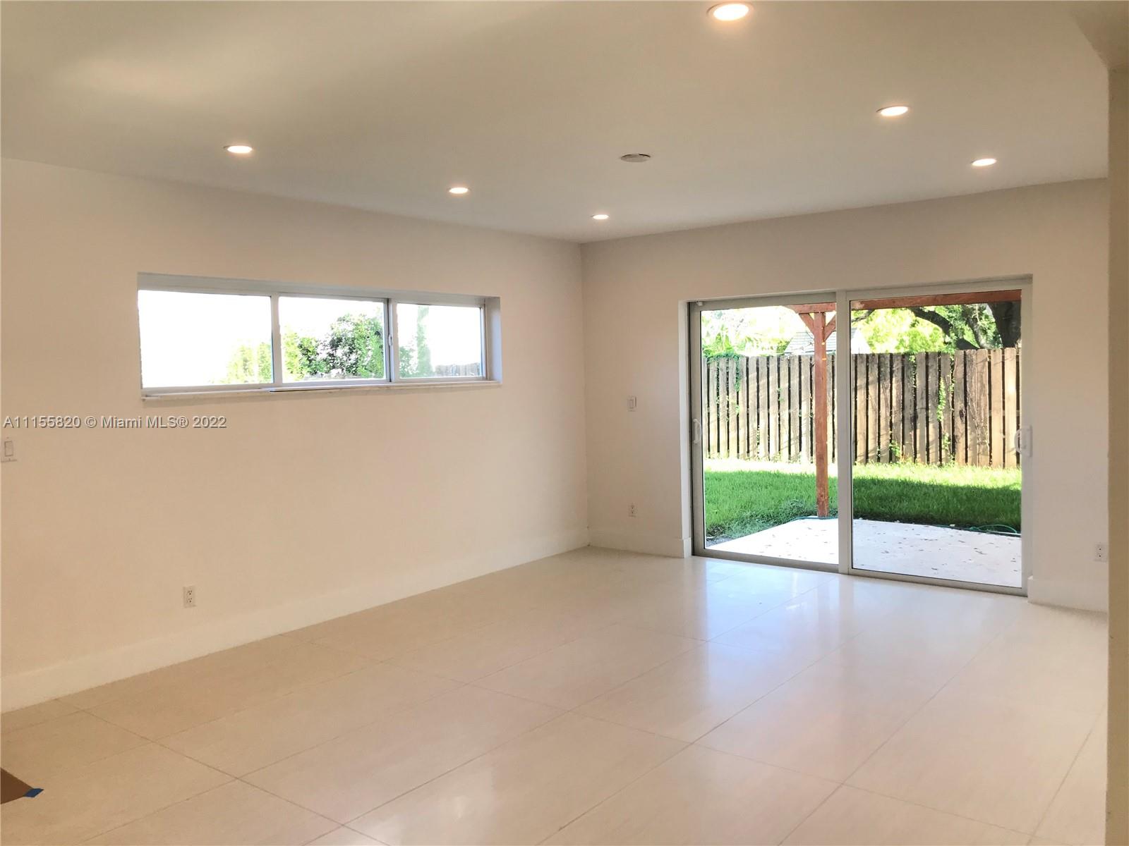 11720 Southwest 81st Road, Unit 11720 Pinecrest, FL 33156 - Photo 28 of 33 a view of an empty room with a balcony