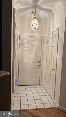 wooden floor in a hall with an entryway