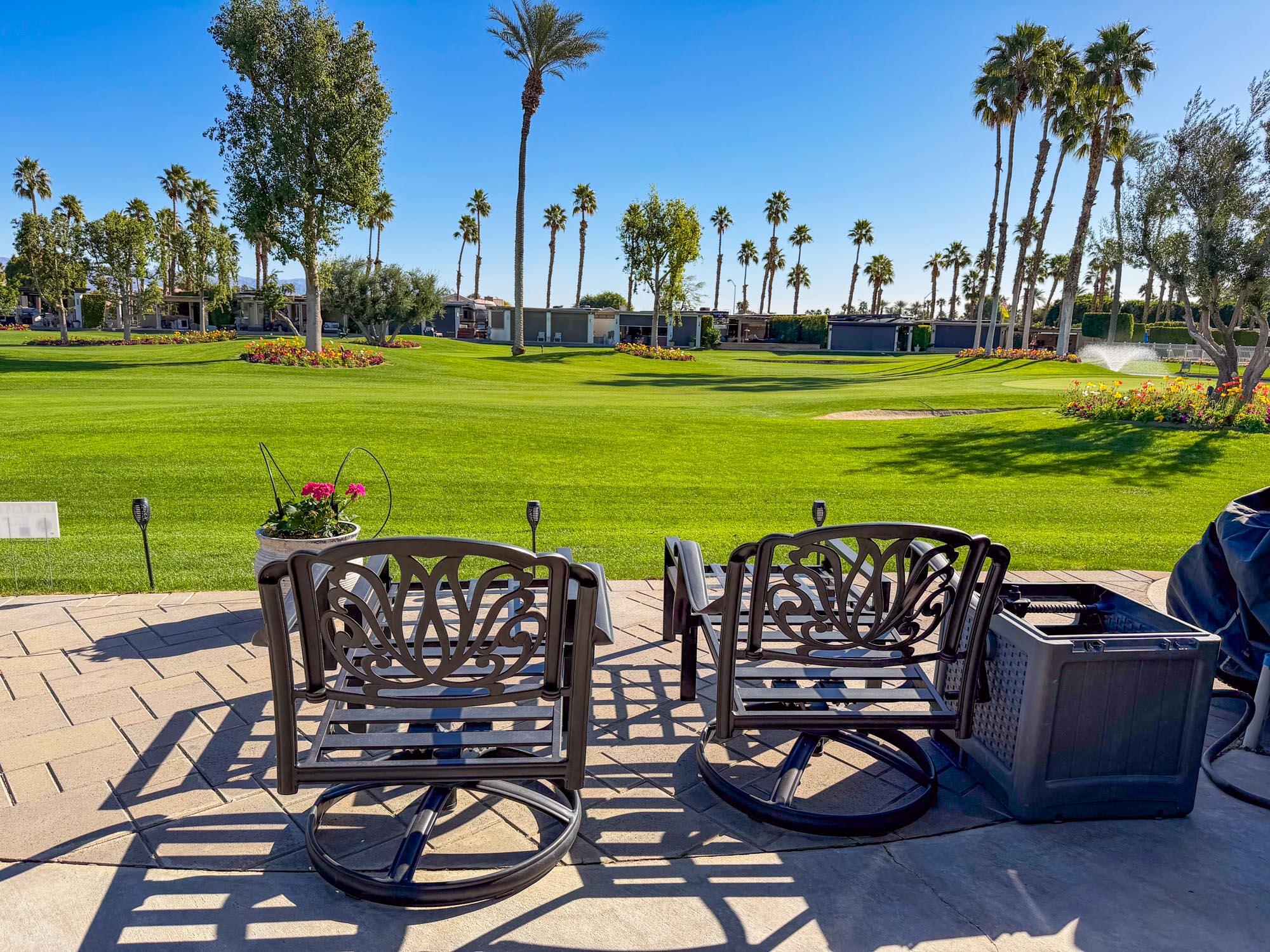 80394 Ave 48, Unit 22 Indio, CA 92201 - Photo 5 of 14 a view of a swimming pool and lounge chairs