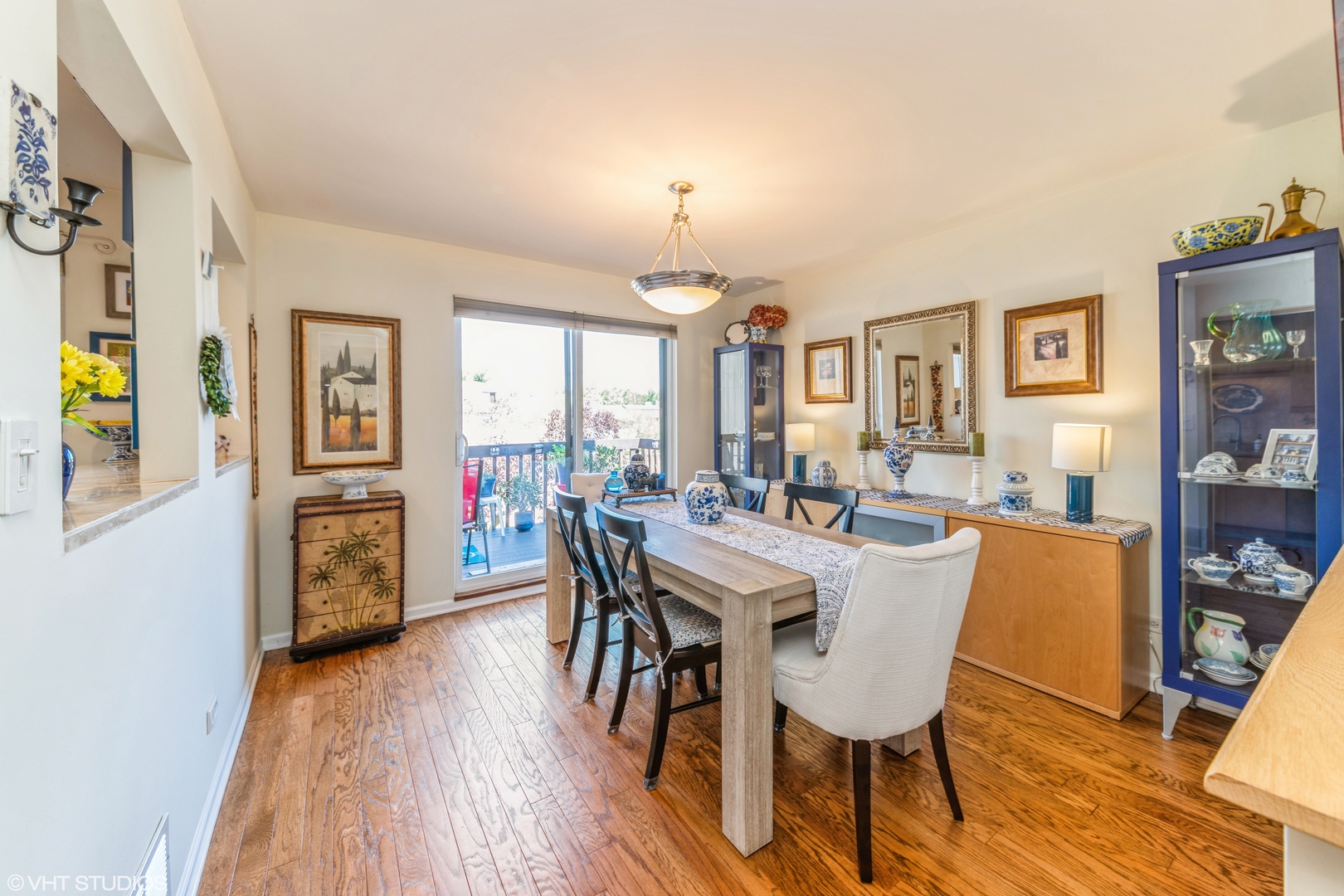 629 High Ridge Road Roselle, IL 60172 - Photo 5 of 20 a view of a dining room with furniture and wooden floor